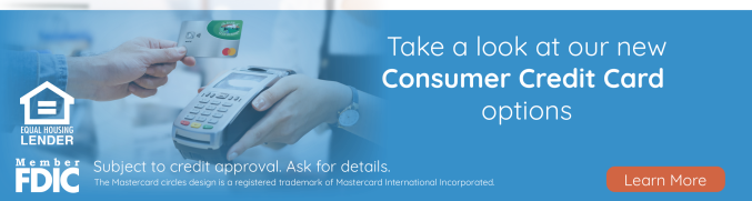 Consumer swiping credit card with learn more about our credit card options button 